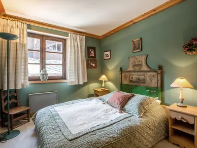 Un ou plusieurs lits dans un hébergement de l'établissement Appartement de charme avec balcon, 8 pers, décor raffiné, au cœur de Val-d’Isère, proche des pistes - FR-1-694-106