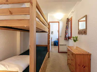 Un ou plusieurs lits dans un hébergement de l'établissement Appartement cosy et bien équipé, proche du centre et des pistes à Val-d'Isère - FR-1-694-113