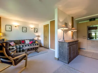 Coin salon dans l'établissement Appartement raffiné à Val-d'Isère, 6 personnes, pied des pistes, WiFi - FR-1-694-116