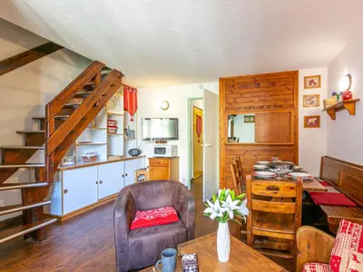 Cuisine ou kitchenette dans l'établissement Duplex 4 pièces avec WiFi, parking et animaux acceptés - FR-1-694-139