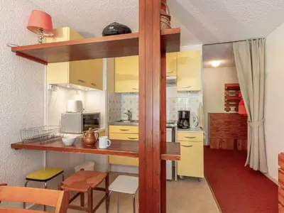 Cuisine ou kitchenette dans l'établissement Studio skis aux pieds à Val-d'Isère, animaux admis - FR-1-694-143