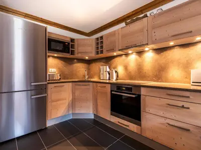 Cuisine ou kitchenette dans l'établissement Appartement de standing avec Sauna au cœur de Val-d'Isère, 6 pers., WIFI - FR-1-694-132