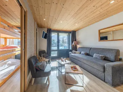 Télévision ou salle de divertissement dans l'établissement Appartement cosy au pied des pistes, animaux acceptés - FR-1-694-144