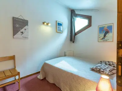 Un ou plusieurs lits dans un hébergement de l'établissement Charmant Duplex à Val-d'Isère avec Wifi, Parking et Balcon Exposé Sud - FR-1-694-148