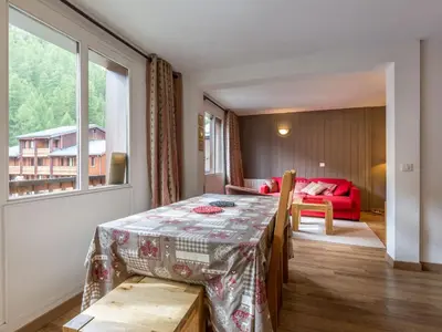 Un ou plusieurs lits dans un hébergement de l'établissement Charmant Duplex à Val-d'Isère avec Wifi, Parking et Balcon Exposé Sud - FR-1-694-148