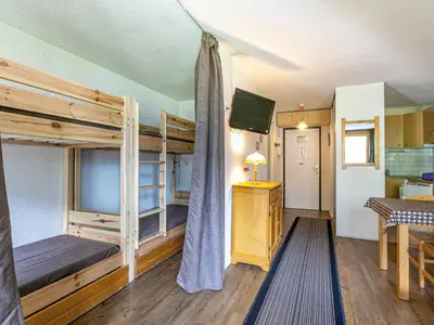 Un ou plusieurs lits dans un hébergement de l'établissement Appartement agréable au pied des pistes avec cuisine équipée - Animaux acceptés - FR-1-694-146