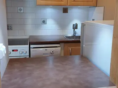 Cuisine ou kitchenette dans l'établissement Val-d'Isère: Appartement 2 Chambres, 4 Pers., Wifi et Animaux Bienvenus - FR-1-694-147