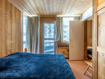 Un ou plusieurs lits dans un hébergement de l'établissement Val-d'Isère: Appartement 2 Chambres, 4 Pers., Wifi et Animaux Bienvenus - FR-1-694-147