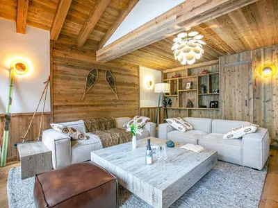 Coin salon dans l'établissement Bel appartement de standing dans résidence neuve au pied des pistes à Val-d'Isère - FR-1-694-155