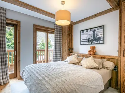 Un ou plusieurs lits dans un hébergement de l'établissement Bel appartement de standing dans résidence neuve au pied des pistes à Val-d'Isère - FR-1-694-155