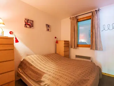Un ou plusieurs lits dans un hébergement de l'établissement Appartement haut de gamme avec Wifi, parking et balcon, au pied des pistes à Val-d'Isère - FR-1-694-151