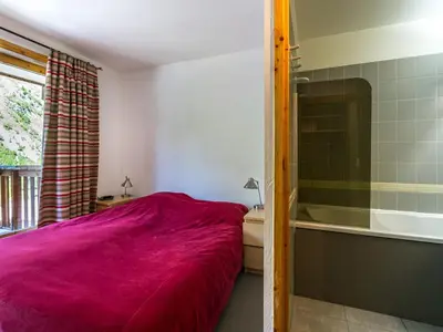 Un ou plusieurs lits dans un hébergement de l'établissement Appartement haut de gamme avec Wifi, parking et balcon, au pied des pistes à Val-d'Isère - FR-1-694-151