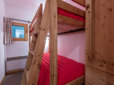 Un ou plusieurs lits dans un hébergement de l'établissement Appartement haut de gamme avec Wifi, parking et balcon, au pied des pistes à Val-d'Isère - FR-1-694-151
