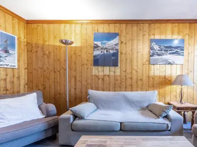 Coin salon dans l'établissement Appartement confortable avec garage et wifi dans secteur calme à Val-d'Isère - FR-1-694-154