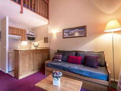 Coin salon dans l'établissement Studio cosy avec Wifi, parking et animaux admis - FR-1-694-166