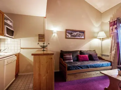Un ou plusieurs lits dans un hébergement de l'établissement Studio cosy avec Wifi, parking et animaux admis - FR-1-694-166