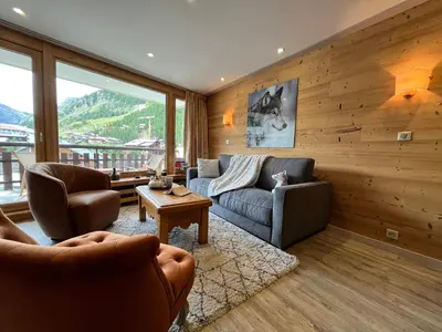 Coin salon dans l'établissement Appartement moderne avec balcon, WiFi et cuisine équipée - FR-1-694-168