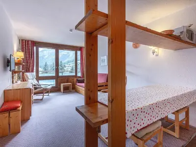 Un ou plusieurs lits dans un hébergement de l'établissement Appartement confortable skis aux pieds avec animaux admis à Val-d'Isère - FR-1-694-177