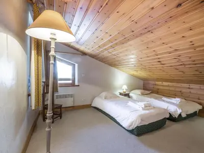 Un ou plusieurs lits dans un hébergement de l'établissement Duplex de Standing au Pied des Pistes avec Grand Balcon, Expo Sud/Ouest, Parking Inclus - FR-1-694-169