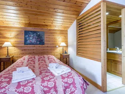 Un ou plusieurs lits dans un hébergement de l'établissement Duplex de Standing au Pied des Pistes avec Grand Balcon, Expo Sud/Ouest, Parking Inclus - FR-1-694-169