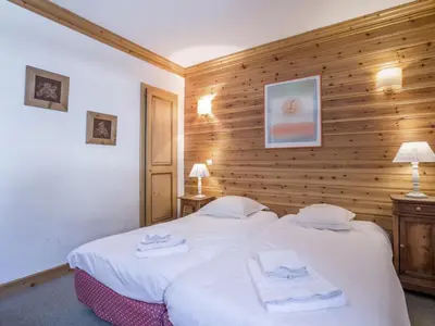Un ou plusieurs lits dans un hébergement de l'établissement Duplex de Standing au Pied des Pistes avec Grand Balcon, Expo Sud/Ouest, Parking Inclus - FR-1-694-169