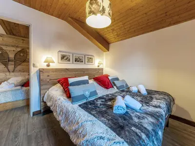 Un ou plusieurs lits dans un hébergement de l'établissement Appartement charmant avec Wifi, animaux acceptés, 34m2 à Val-d'Isère - FR-1-694-172