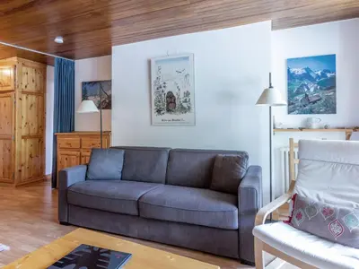 Coin salon dans l'établissement Appartement confortable au sud avec balcon et lave-linge - FR-1-694-180