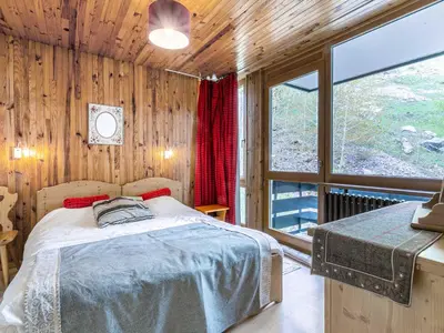 Un ou plusieurs lits dans un hébergement de l'établissement Appartement confortable 5 pers, vue village - FR-1-694-195