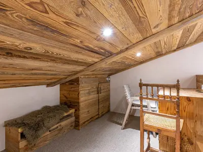 Coin salon dans l'établissement Appartement de Prestige avec Cheminée au Centre de Val-d'Isère, à Proximité des Pistes et Commerces - FR-1-694-205