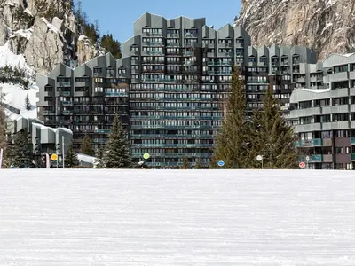 L'établissement Appart cosy skis aux pieds avec parking et wifi, animaux admis à La Daille - FR-1-694-245 en hiver