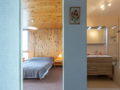 Un ou plusieurs lits dans un hébergement de l'établissement Charmant appartement 2 pièces avec animaux acceptés - FR-1-694-243
