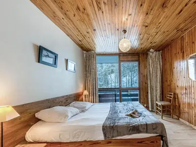 Un ou plusieurs lits dans un hébergement de l'établissement Appartement rénové 2 pièces à Val-d'Isère, balcon, animaux acceptés - FR-1-694-241