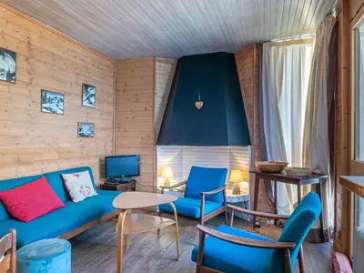Coin salon dans l'établissement Charmant 3 pièces avec balcon, Wifi, acceptant animaux, au centre de Val-d'Isère - FR-1-694-252