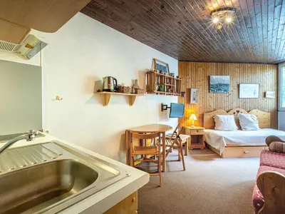 Un ou plusieurs lits dans un hébergement de l'établissement Studio confortable avec parking à Val-d'Isère - FR-1-694-269
