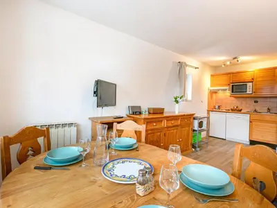 Cuisine ou kitchenette dans l'établissement Appartement skis aux pieds avec parking couvert et WiFi au cœur de Val d'Isère - FR-1-694-259