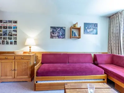 Coin salon dans l'établissement Appartement 2 pièces avec parking et wifi à Val-d'Isère - FR-1-694-284