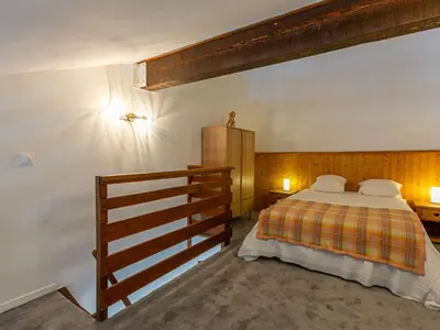 Un ou plusieurs lits dans un hébergement de l'établissement Charmant studio à Val-d'Isère avec balcon Sud/Ouest, proche commodités, navette gratuite - FR-1-694-289