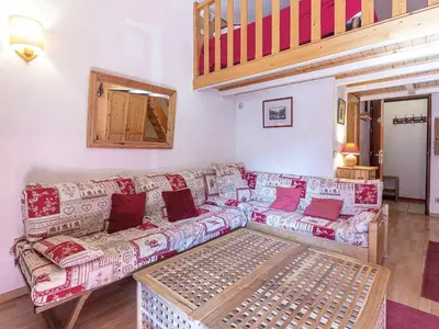 Coin salon dans l'établissement Spacieux appartement 9 pers. à Val-d'Isère, skis aux pieds, Wi-Fi, proche commodités - FR-1-694-306