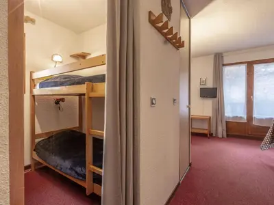 Un ou plusieurs lits dans un hébergement de l'établissement Studio confortable avec lits faits et ménage inclus à Val-d'Isère - FR-1-694-288