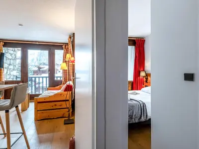 Un ou plusieurs lits dans un hébergement de l'établissement Appartement rénové skis aux pieds avec parking et wifi à Val-d'Isère - FR-1-694-280