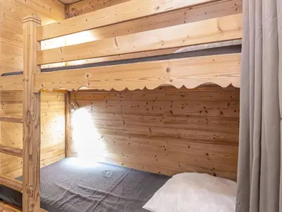 Un ou plusieurs lits dans un hébergement de l'établissement Studio cosy à Val-d'Isère près des pistes, animaux admis - FR-1-694-298