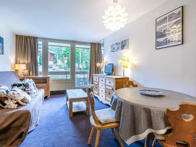 Coin salon dans l'établissement Studio cosy à Val-d'Isère près des pistes, animaux admis - FR-1-694-298