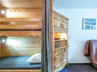 Un ou plusieurs lits dans un hébergement de l'établissement Studio cosy à Val-d'Isère près des pistes, animaux admis - FR-1-694-298