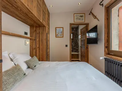 Un ou plusieurs lits dans un hébergement de l'établissement Appartement skis aux pieds, balcon sud, 8 pers, cheminée, Wifi - Val-d'Isère - FR-1-694-292