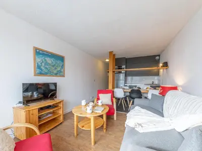 Télévision ou salle de divertissement dans l'établissement Appartement lumineux Sud à La Daille avec Wifi et Animaux admis, skis aux pieds - FR-1-694-258