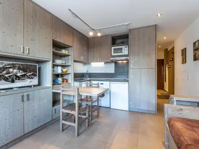 Cuisine ou kitchenette dans l'établissement Studio cabine rénové au pied des pistes avec wifi et animaux acceptés - FR-1-694-299