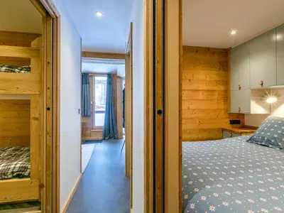 Un ou plusieurs lits dans un hébergement de l'établissement Appartement rénové 2022 avec wifi, balcon sud, 5 pers, équipements famille, proche commodités - FR-1-694-294