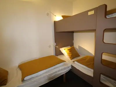 Un ou plusieurs lits dans un hébergement de l'établissement Appartement rénové 3 pièces, balcon, 6-7 pers, WIFI - FR-1-346-538