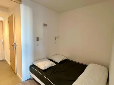 Un ou plusieurs lits dans un hébergement de l'établissement Appartement rénové 3 Pièces, Balcon, 6/7 pers., WIFI - FR-1-346-539