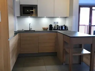 Cuisine ou kitchenette dans l'établissement Appartement avec balcon, jacuzzi, sauna, salle de fitness, 3 chambres, parking - FR-1-346-536